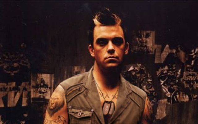 Demandan a Robbie Williams y a su mujer por acoso sexual